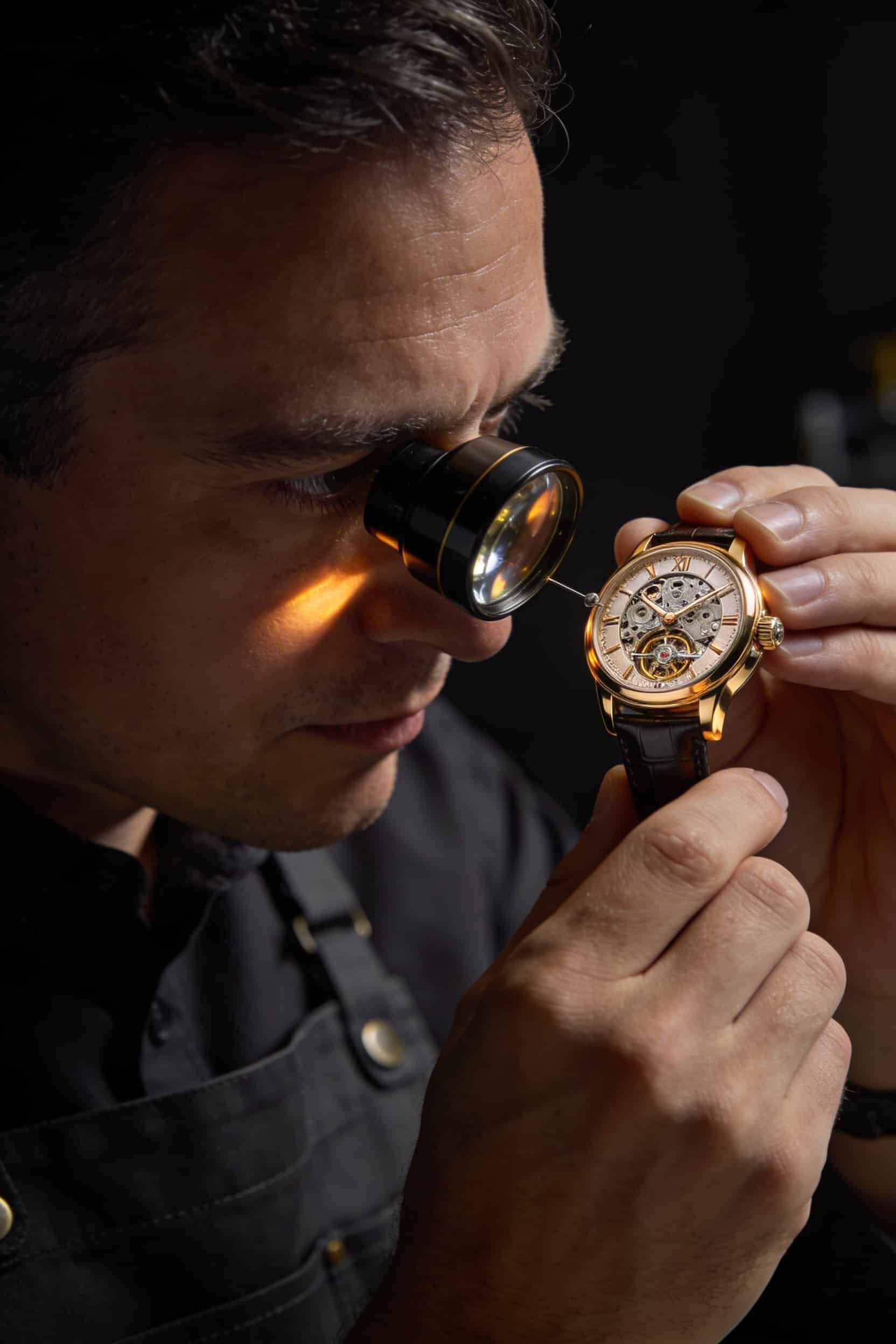 watchmaker inspecting automatic watch faq